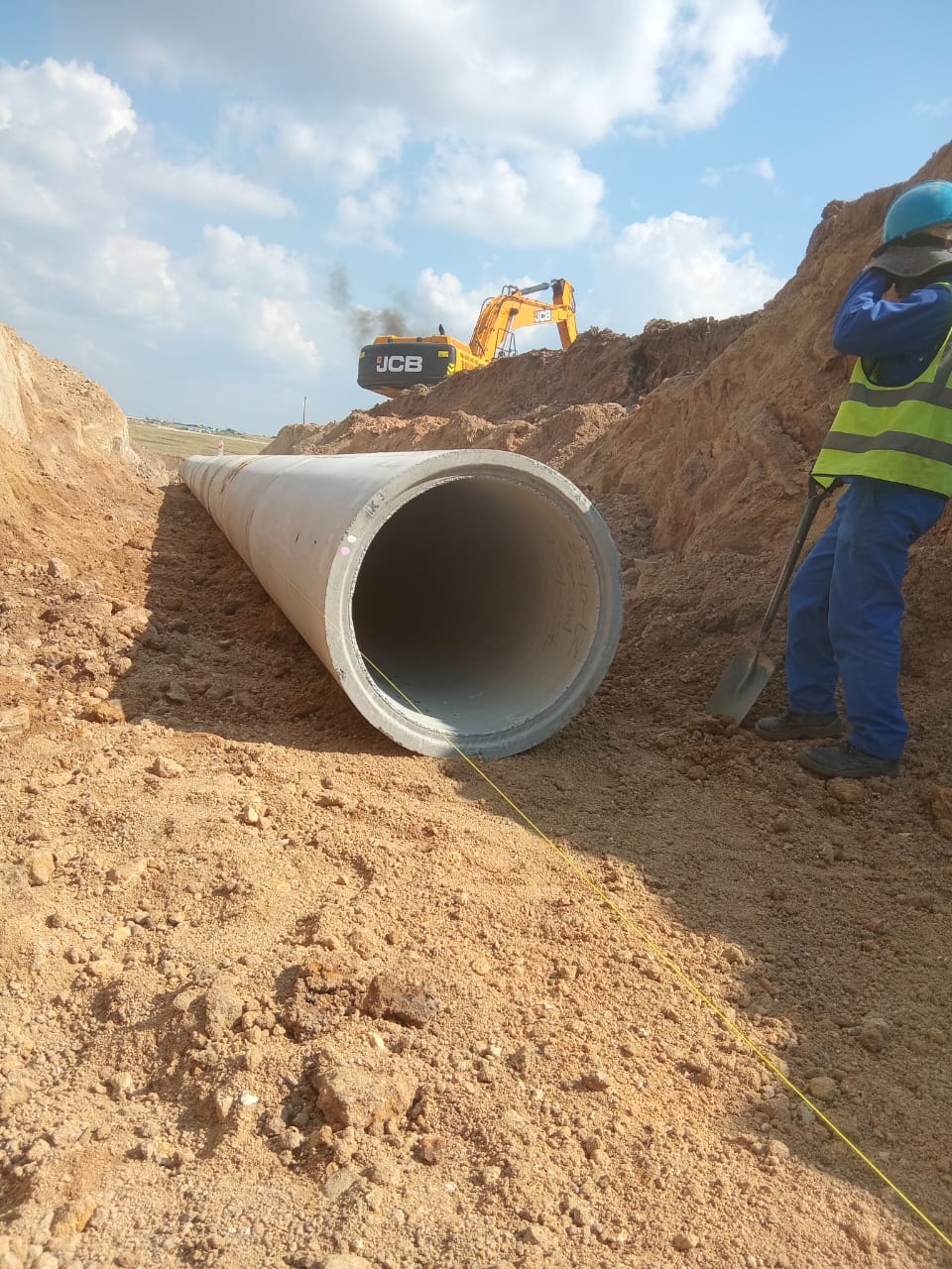 Large concrete stormwater or sewer pipe laid in an excavated trench